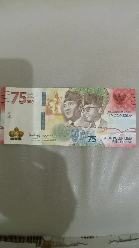 Uang pecahan 75 000