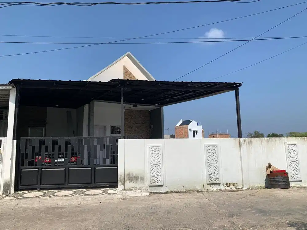 Rumah siap huni, lokasi strategis, halaman luas