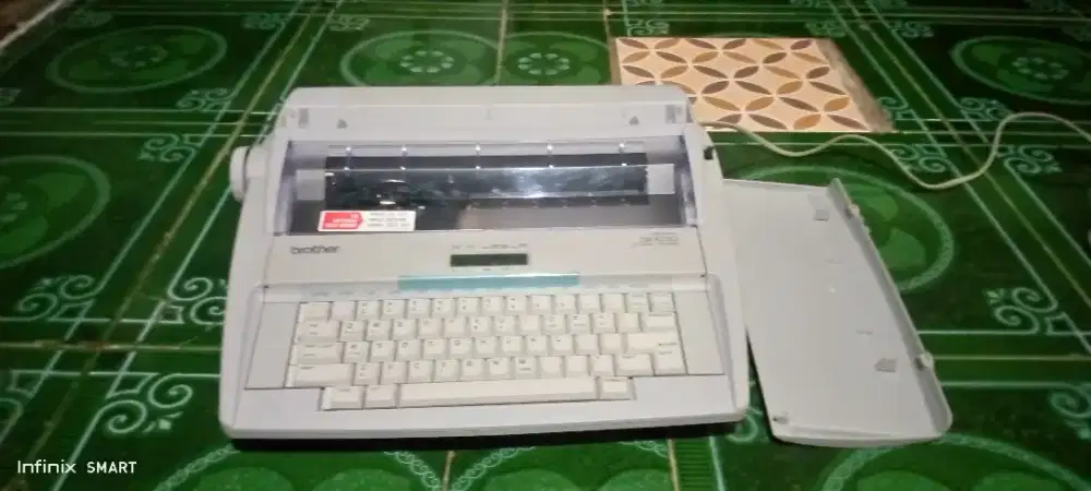 Mesin tik listrik brother