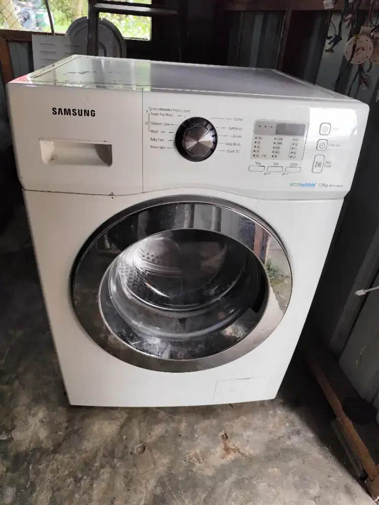 Terima mesin cuci yang rusak