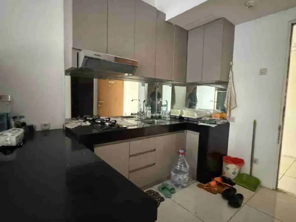 Disewakan murah apartemen puncak bukit golf. 2 BR.semi furnished . Surabaya barat