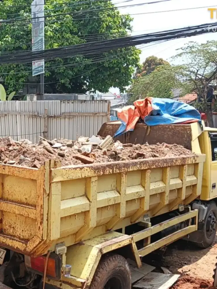 Urugan Atau Buang sisa puing tanah dan smph