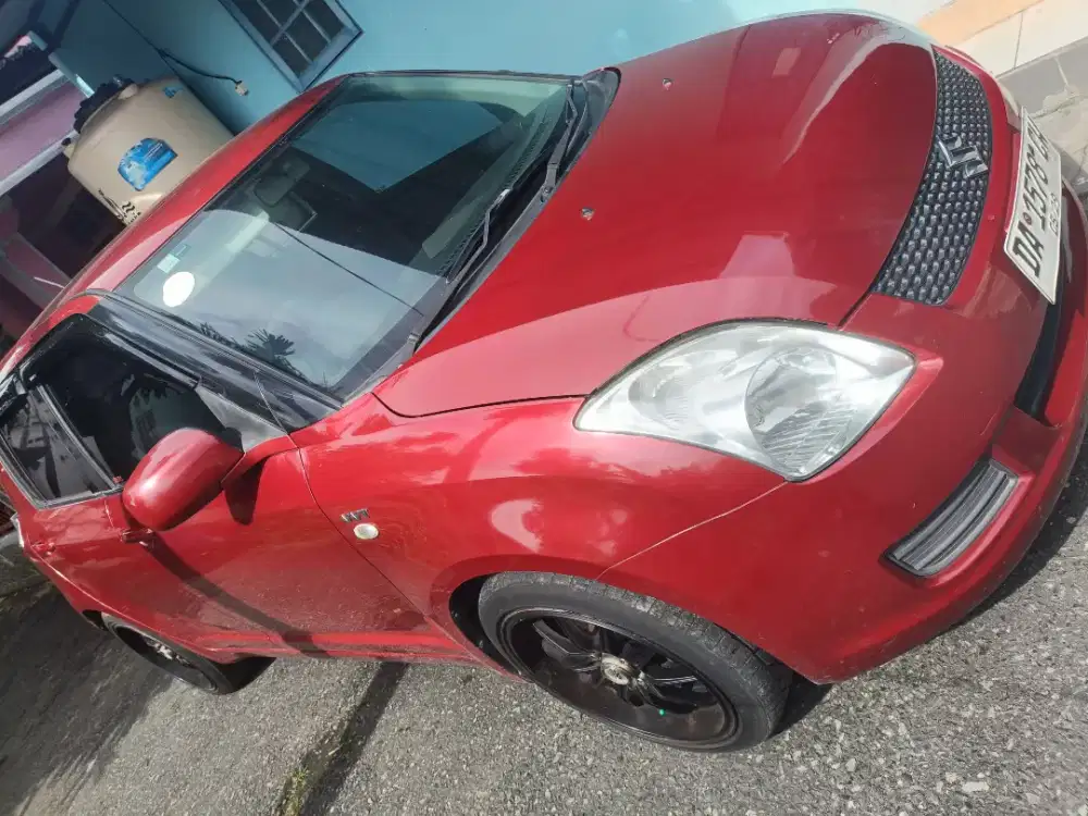 Suzuki Swift 2009 Merah/Manual