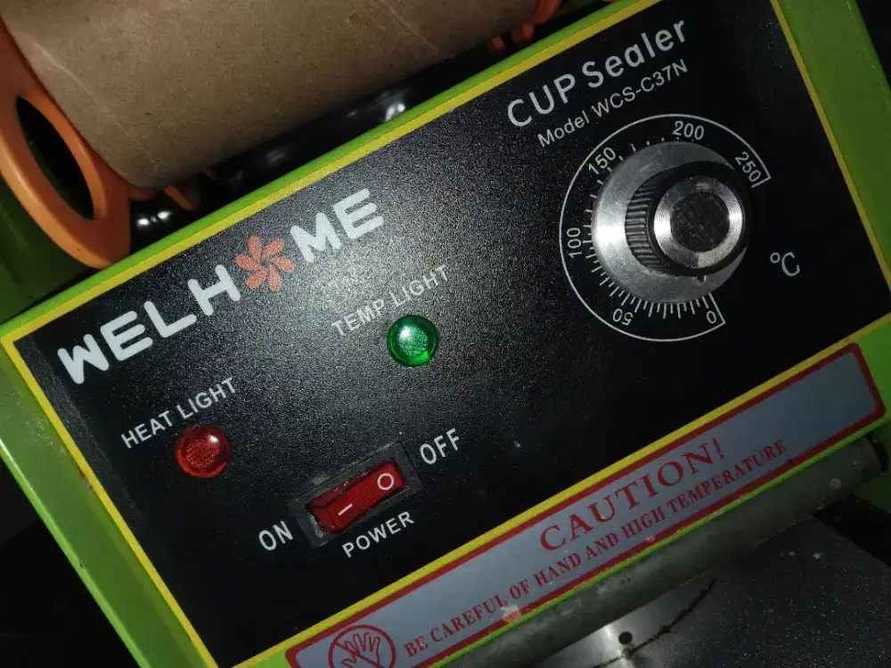 Sealer gelas plastik.