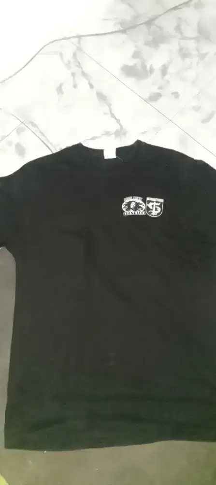 kaos  nominus ukuran XL harga Rp100.000