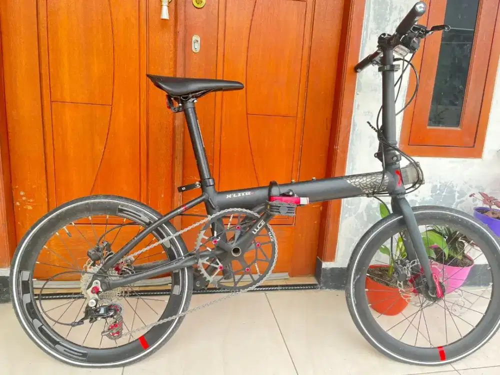 Sepeda lipat merk Xlite LX baru satu x pemakaian