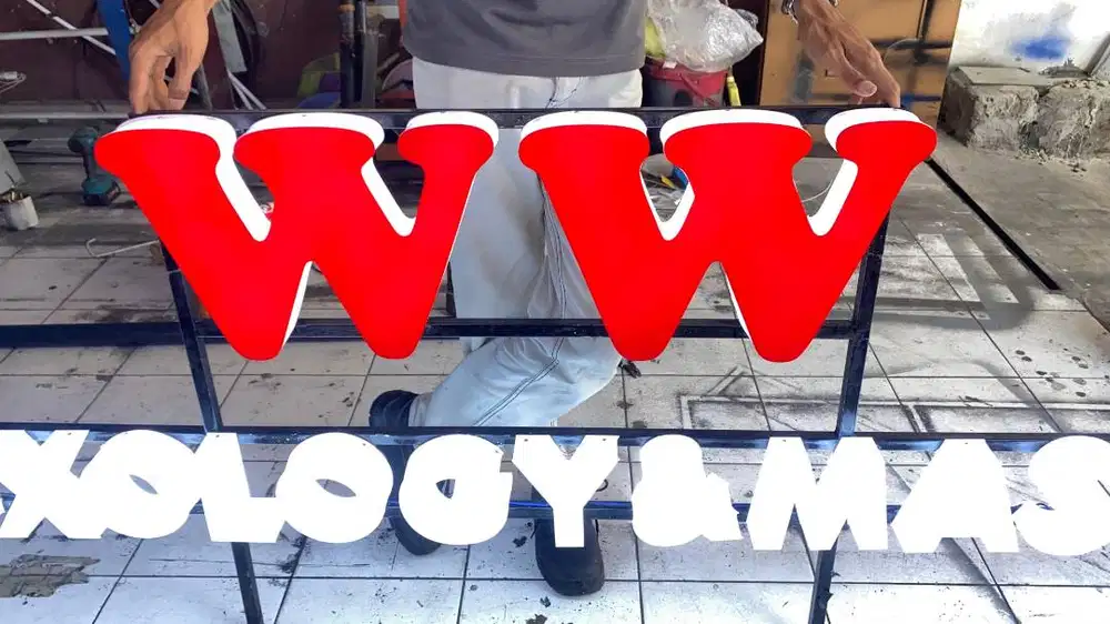 Huruf timbul akrilik lampu + Rangka besi