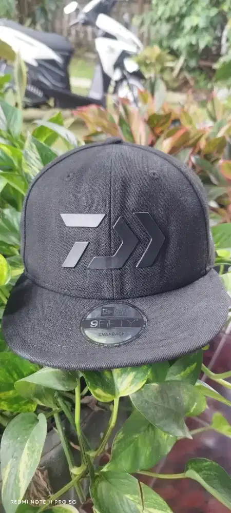 Topi snapback Daiwa new era