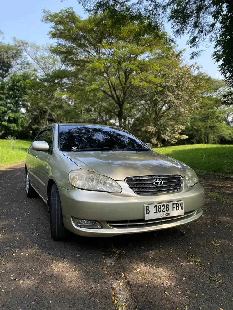 Toyota corolla altis 1.8 g 2004 champagne (kuning metalik)