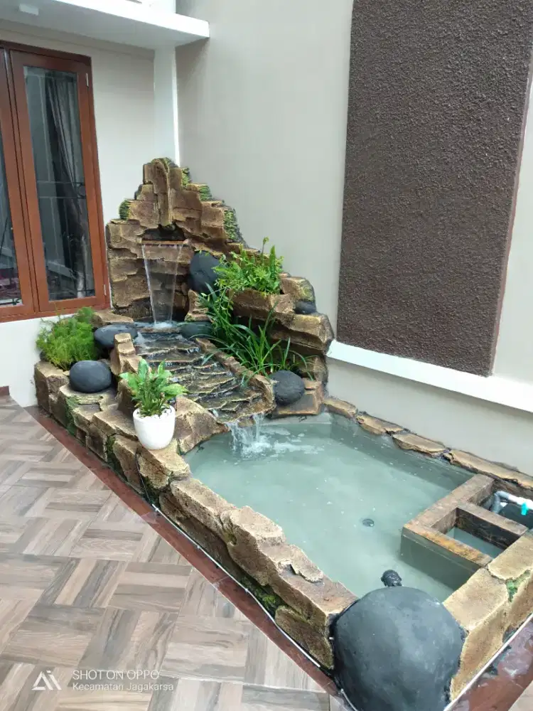 Kolam relif tebing kolam ikan koi