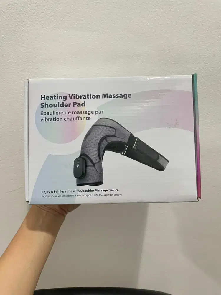 Alat pijat terapi lutut bahu elektrik.