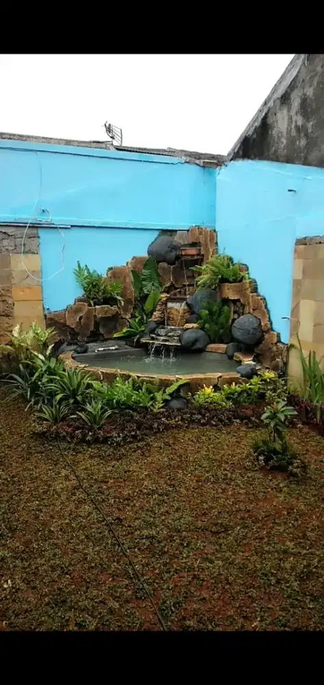 Tukang kolam ikan koi relief