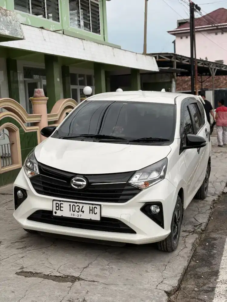 Sigra r manual .KM 10rb.