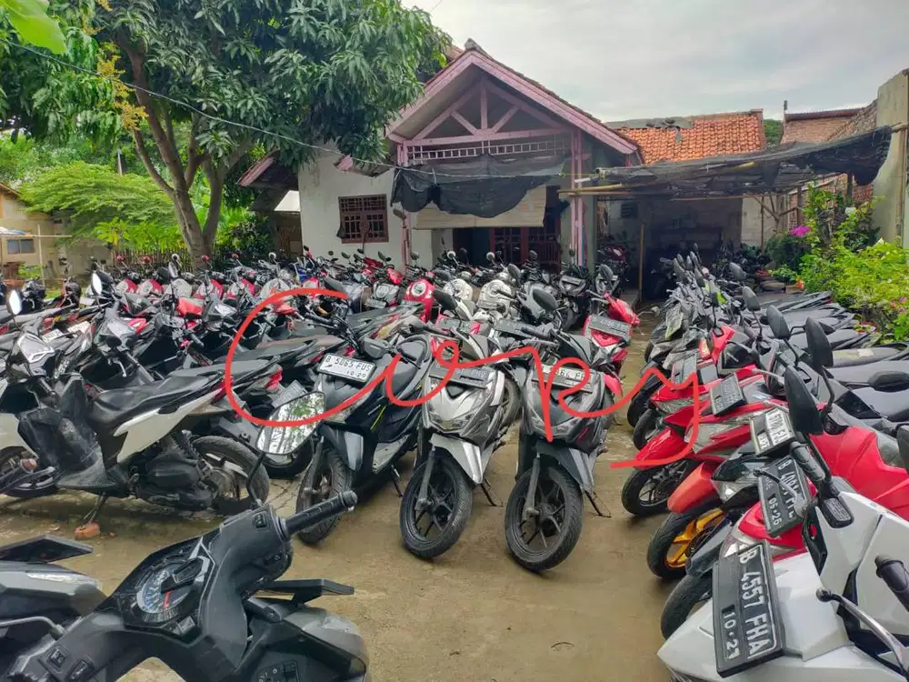 Rumah + Usaha parkiran motor