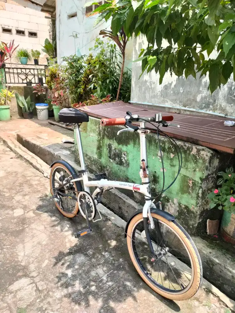 Folding bike London Taxi