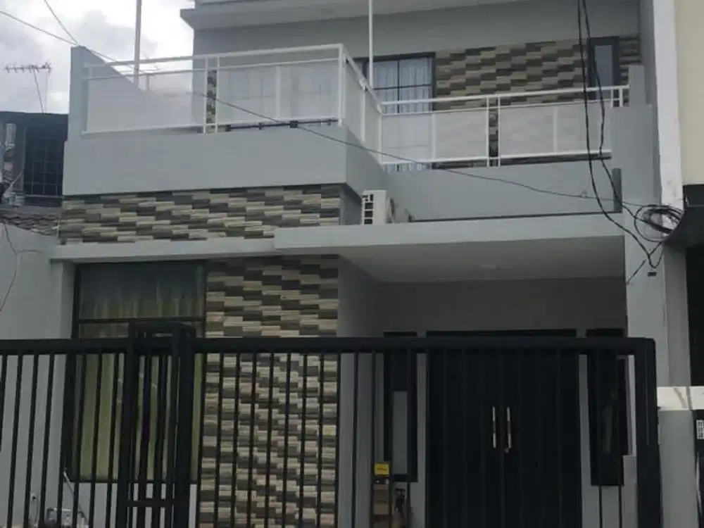 Rumah minimalis bagus Taman Surya uk. 6x18m, murah