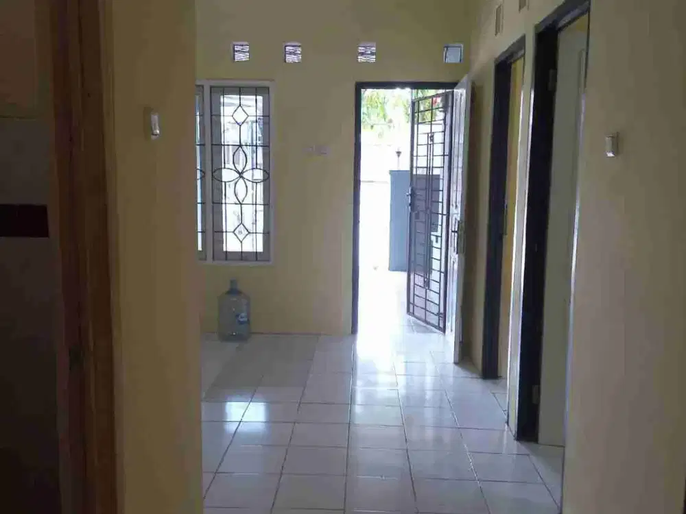 rumah rapih dalam cluster taman harapan baru bekasi