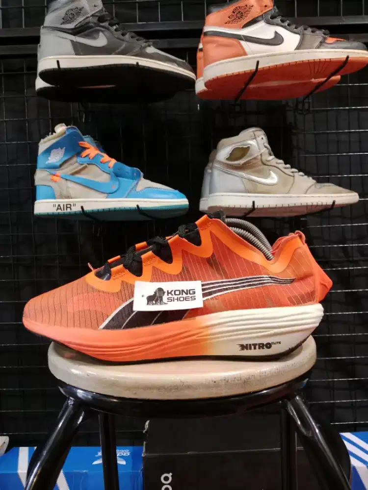 SEPATU PM FAST FWD NITRO ELTE ORANGE