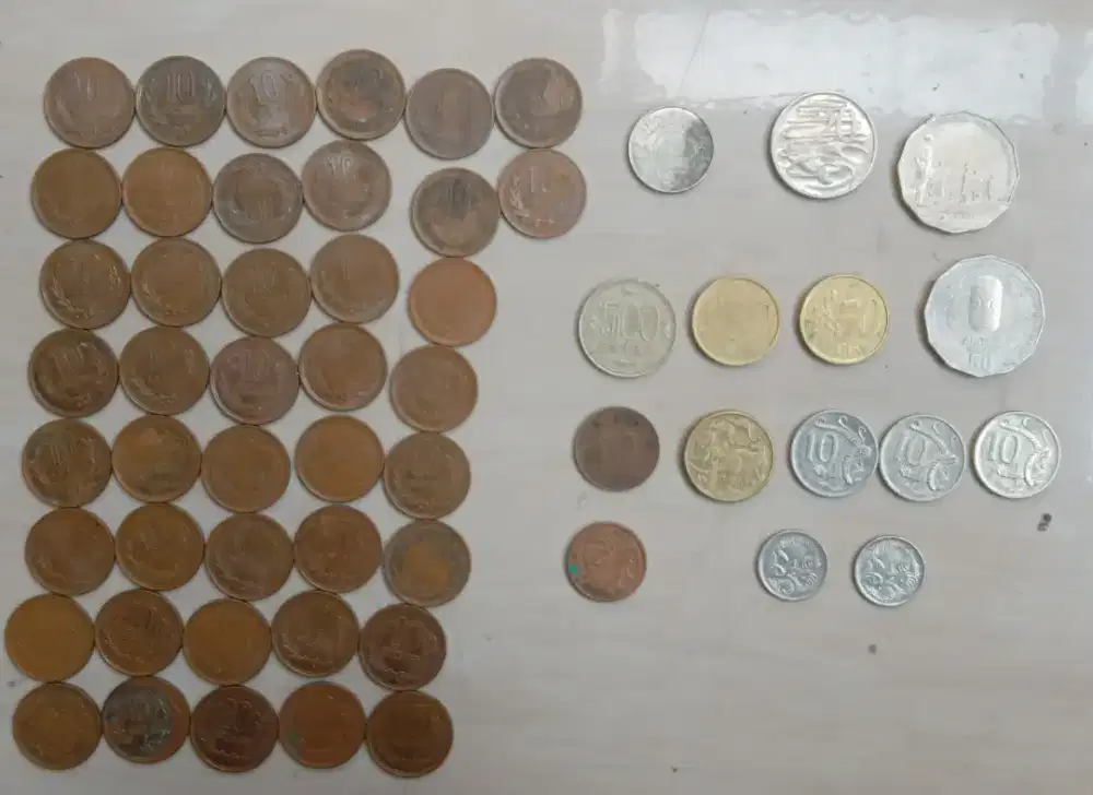 Jual Uang Koin asing ada 57 Keping Koin Sesuai Foto iklan.