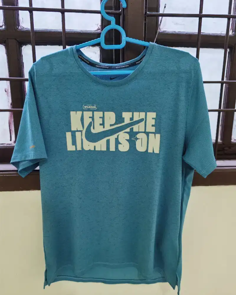 Baju running Nike Dan celana running adidas