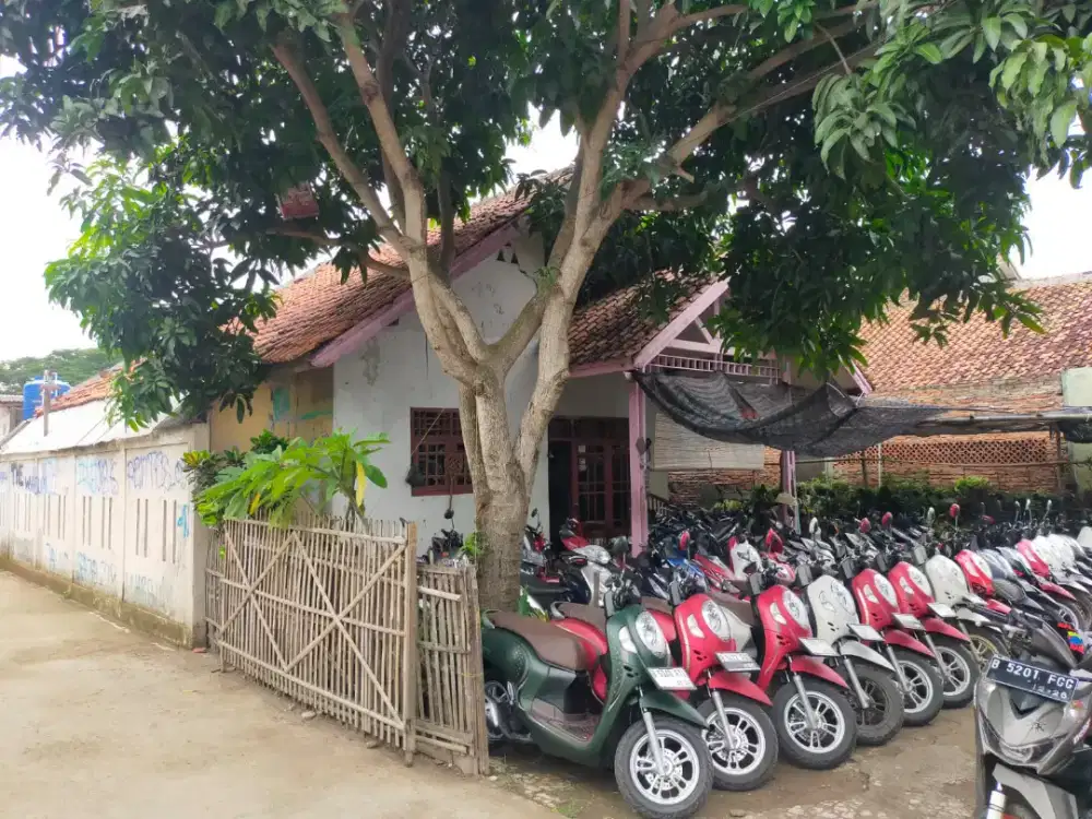 Rumah + Usaha parkiran motor