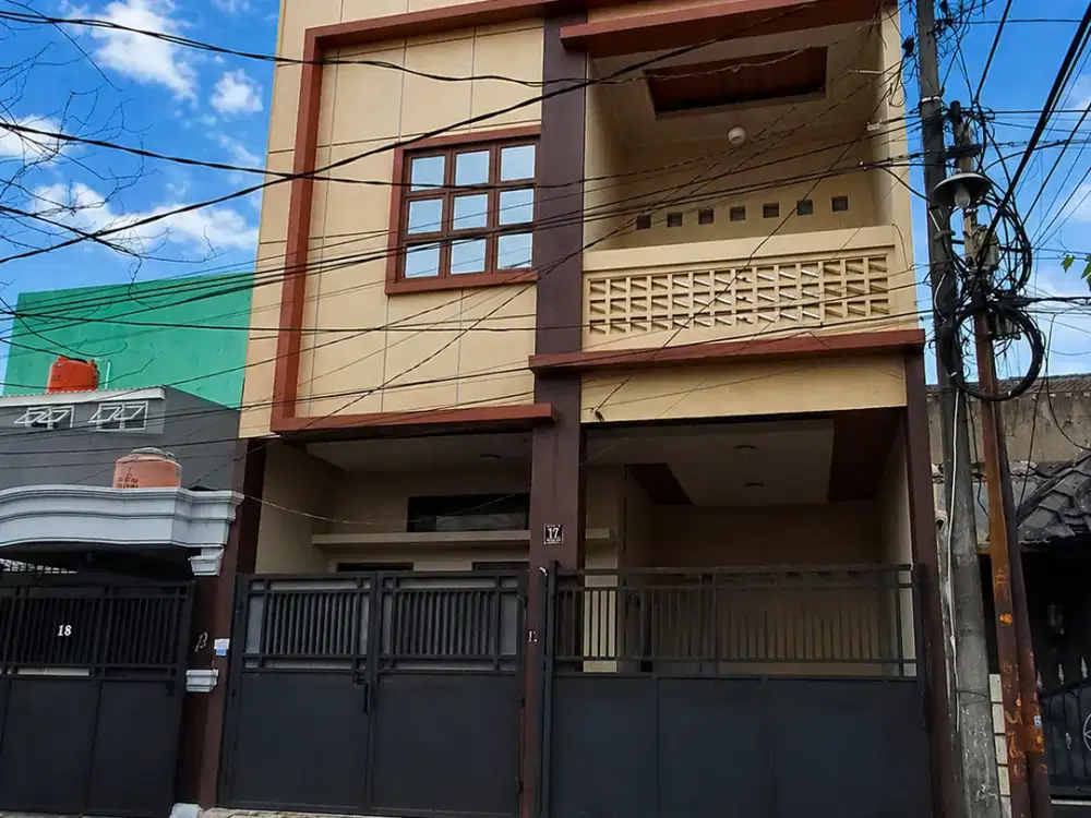 Rumah Modern 2,5 Lantai + Rooftop di Poris Indah – Lokasi Strategis, Harga 1,6 M!