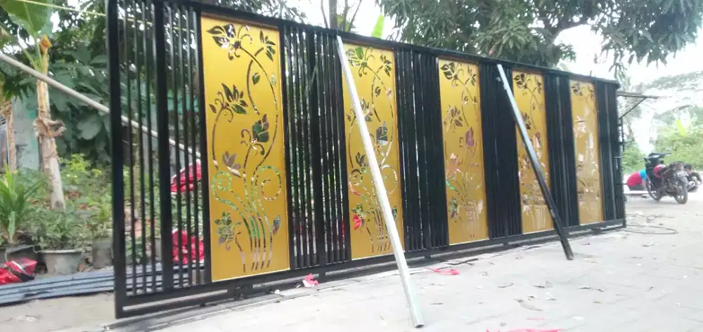 Menerima jasa dn pembuatan pintu garasi besi