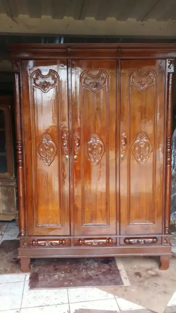 Lemari kayu jati ukir bekas dah melamin 3 pintu