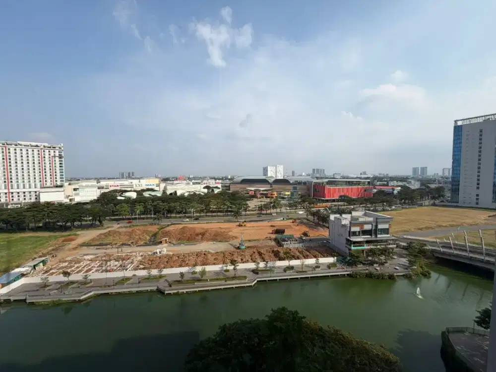 CALDESIA Springlake Summarecon Bekasi lantai Belasan Studio Full Furnished jual RUGI hadap MAL dan DANAU