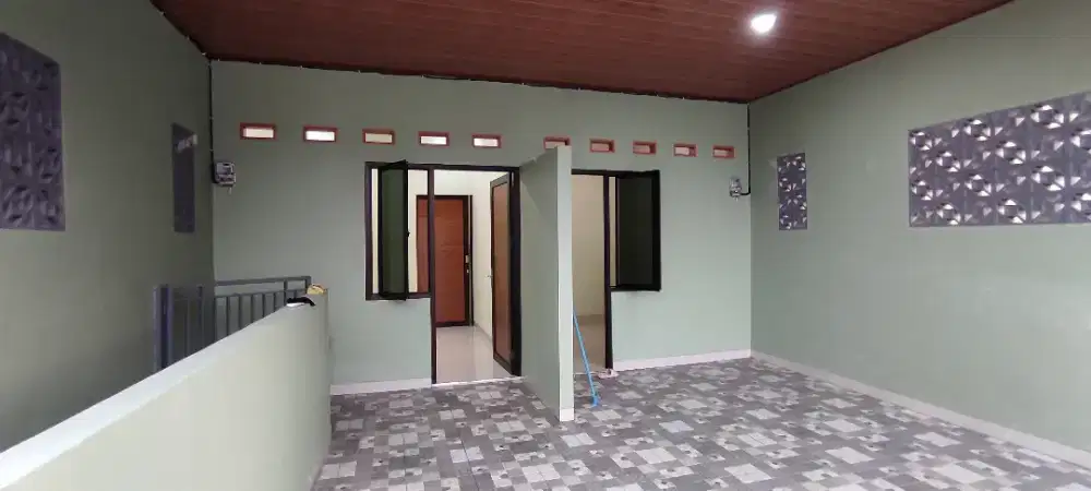 Dikontrakkan tahunan rumah petakan di jl.nenas 2 no.96 perumnas 1 Krwc