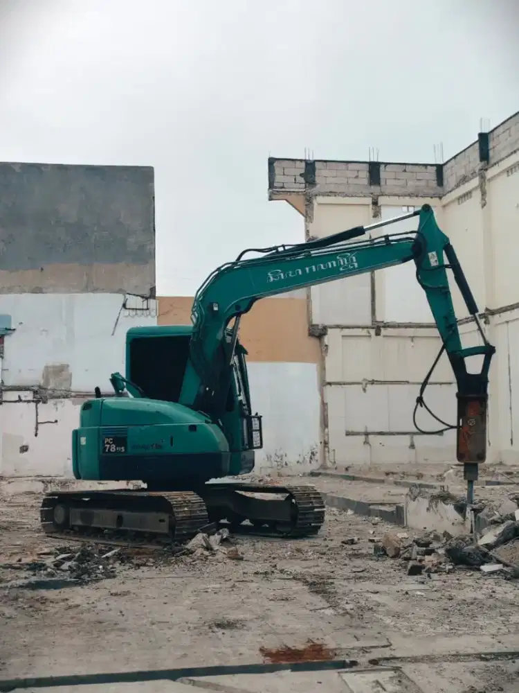 Jasa perataan bangunan dan pembersihan lahan