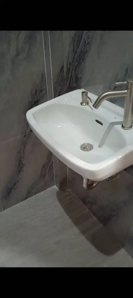 Tukang ahli kamar mandi