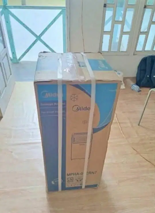 AC PORTABLE Merek MIDEA