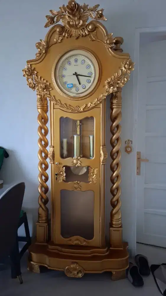 Jam jati jepara berdiri warna gold