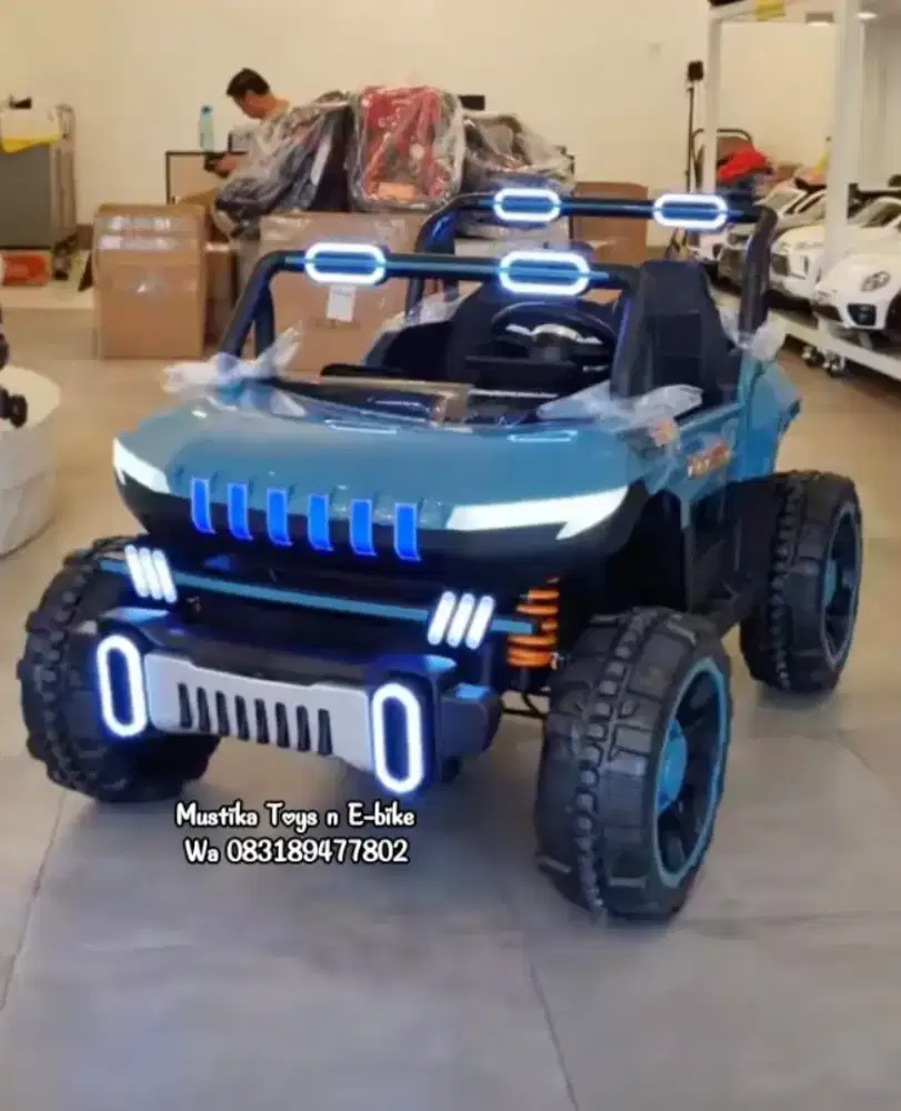 Mobil Aki Jeep Pasific UK jumbo sudah ban karet dan jok kulit,garansi