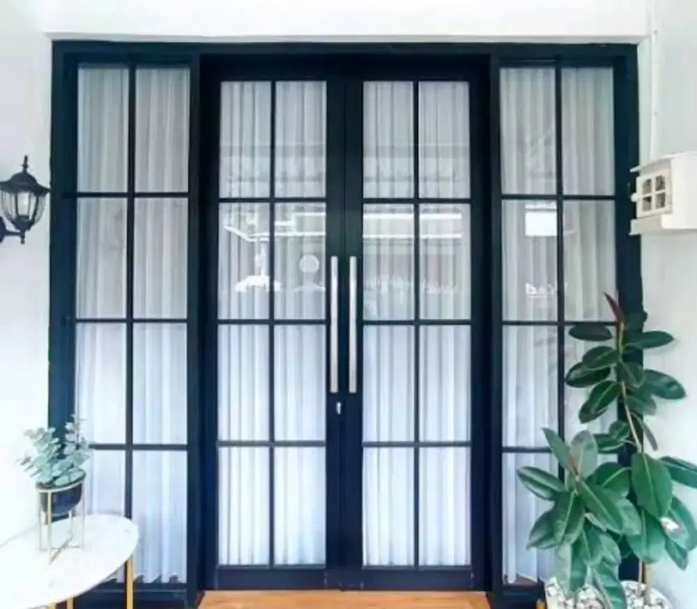 Pemasangan pintu dan jendela alumunium