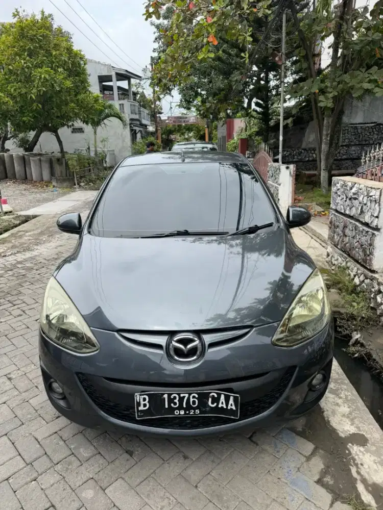 Mazda 2 R sedan dp 10jt aja