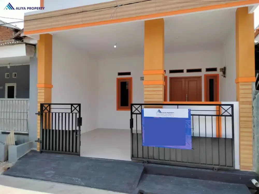 Rumah Cluster Eksklusif Dengan Taman Hijau