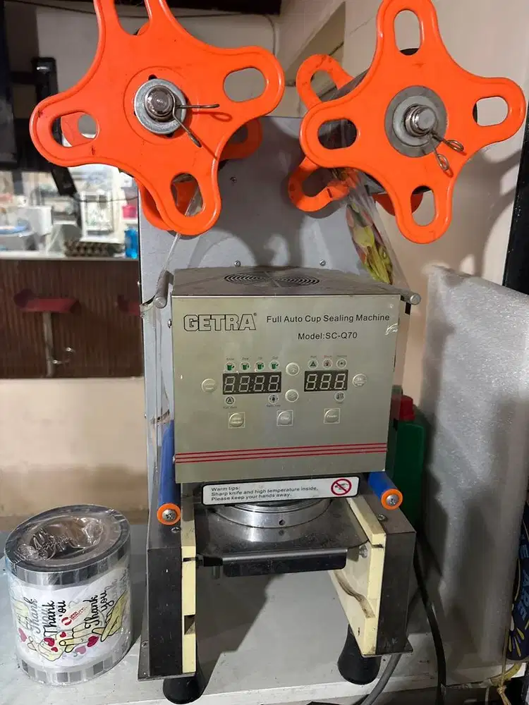 Full auto cup sealing mesin