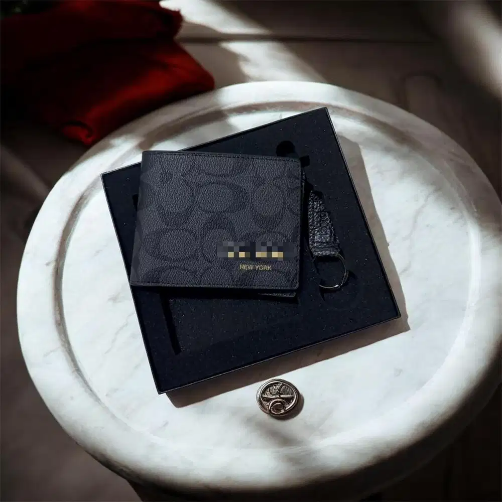 DOMPET KULIT HITAM PRIA MERK C**CH