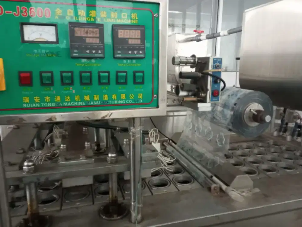 Mesin Cup Sealer 4 Line AMDK (air minum dalam kemasan)