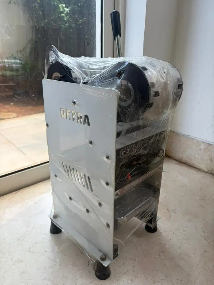 GETRA Mesin Cup Sealer Manual