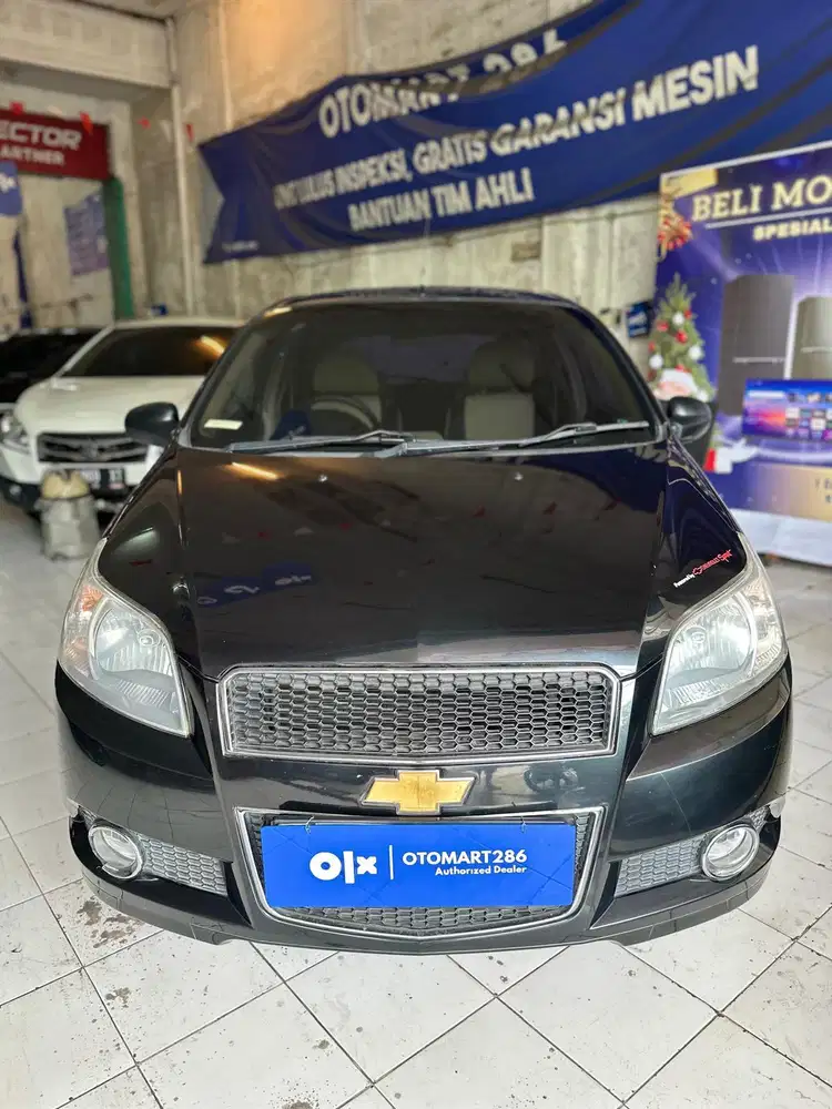 CHEVROLET 2008 AVEO 1.5 M/T HITAM MURAH OTOMART 286 KENJERAN