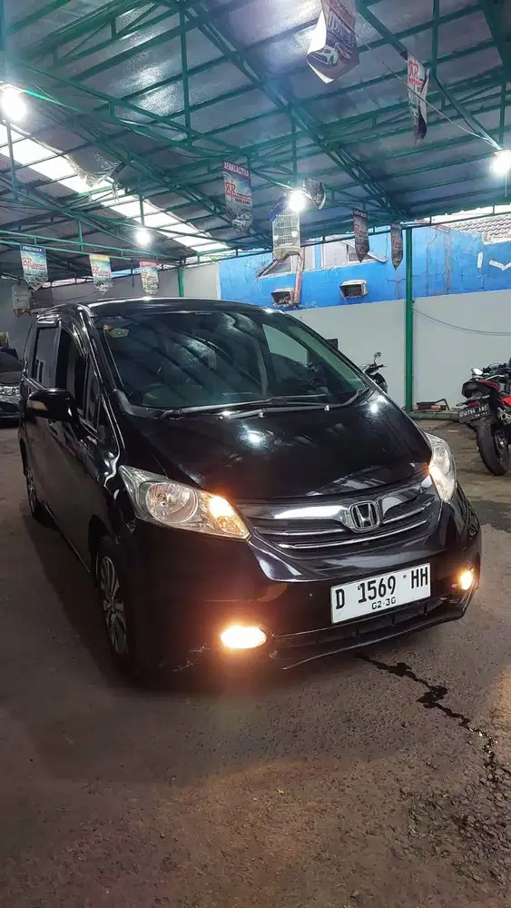 DP 9 JT Honda Freed E PSD 1.5 AT AC Double 2014 Mulus