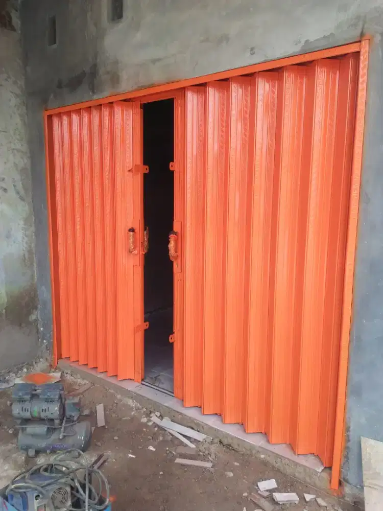 Rolling door folding gate