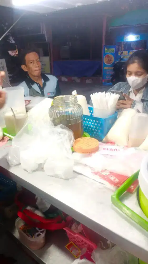 Penjaga stand minuman