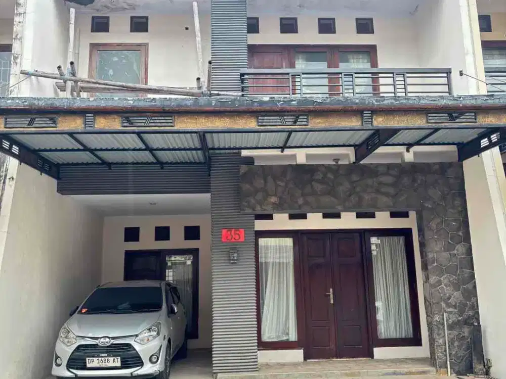 rumah 2 lantai poros hertasning makassar dekat pettarani