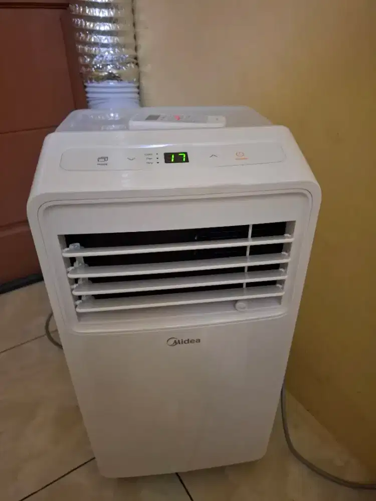 AC Portable Midea ½ PK