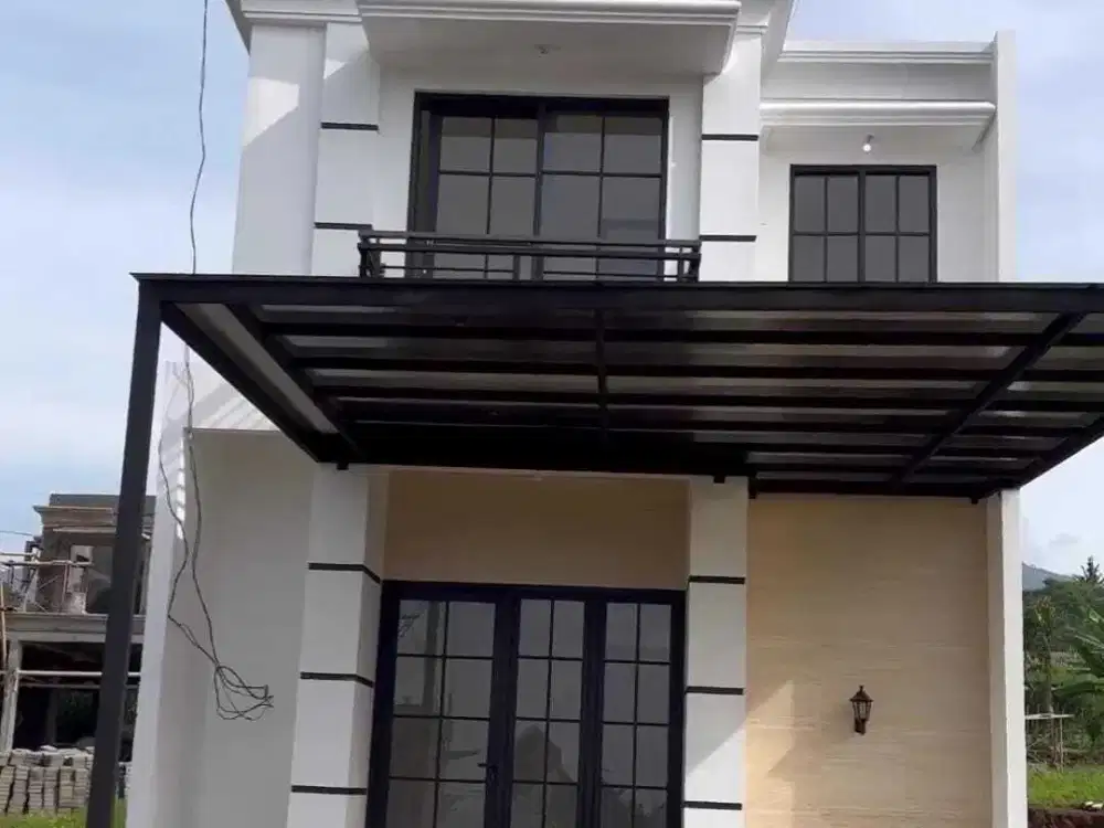 RUMAH 2 LANTAI KONSEP VILLA DI KARANGPLOSO