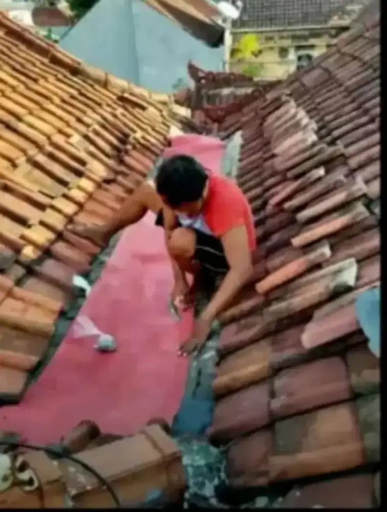 Perbaikan atap bocor talang air dak rembes